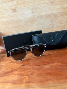 Persol Men’s Transparent Gray Round Sunglasses with Dark Lenses